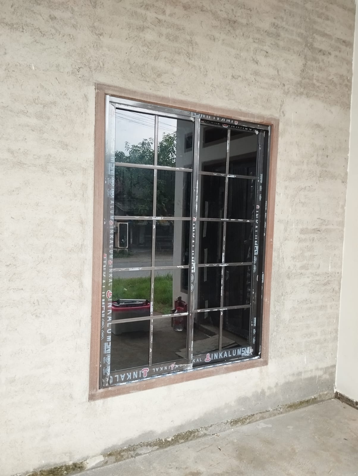 Jendela aluminium hasil pemasangan